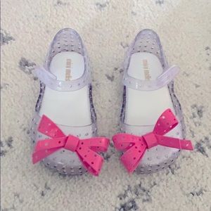 Mini Melissa clear with pink bow, size 7